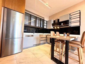 Seafront Apartment In Kargicak, Alanya For Sale - Stylish fully fitted kitchen with built-in appliances