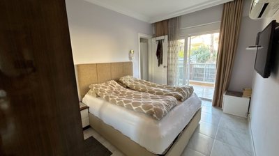 Ground Floor Apartment In Belek, Antalya For Sale - The first bedroom, with a balcony