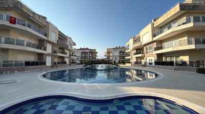 Ground Floor Apartment In Belek, Antalya For Sale - A beautiful shared pool and sun terraces