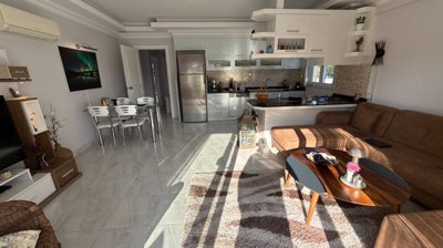 Ground Floor Apartment In Belek, Antalya For Sale - Lounge area to the kitchen