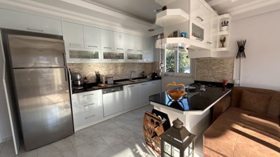 Ground Floor Apartment In Belek, Antalya For Sale - A fully decked out kitchen with built-in appliances