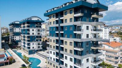 Modern Alanya One-Bedroom Property For Sale – Main view of the apartment complex