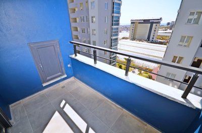 Modern Alanya One-Bedroom Property For Sale – Balcony from the living area with local views