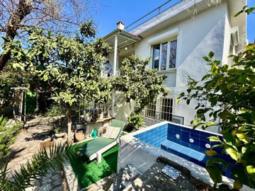 Traditional 4-Bedroom Property For Sale In Fethiye – A plunge pool and lovely mature plants and trees