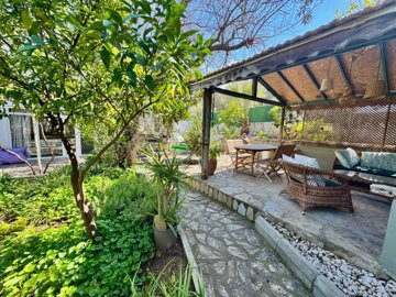 Traditional 4-Bedroom Property For Sale In Fethiye – Shaded seated pergola in the private garden