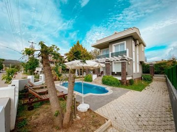 Exquisite Fethiye Property For Sale - A gorgeous easy-to-maintain outdoor space with seating