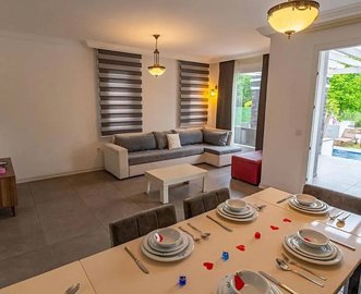 Exquisite Fethiye Property For Sale - Dining area to the lounge with pool access