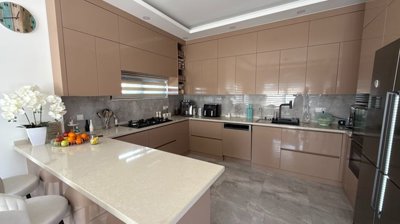 A Desirable Twin Villa For Sale in Antalya - A fully fitted kitchen with built-in appliances