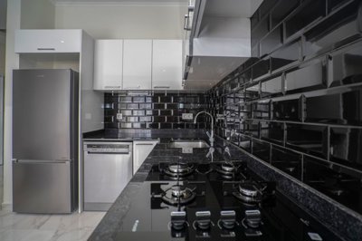 Ready To Move Duplex Apartment In Kestel, Alanya - Stylish black and white kitchen