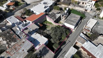 Three plots with stone-built houses in Giolou, Paphos