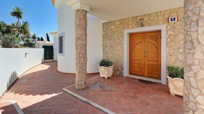 main entrance & gate to laundry entrance