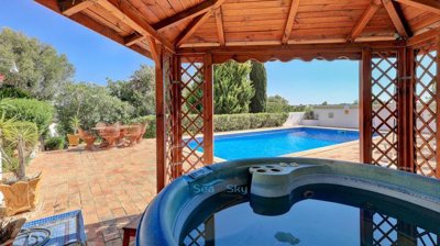 hot tub on pool terrace