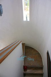 staircase with feature window