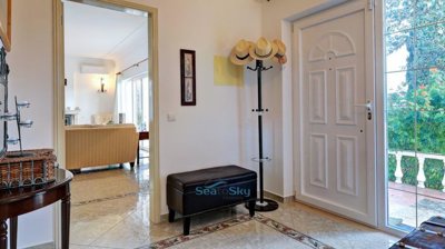 hall through to open plan living dining kitchen area