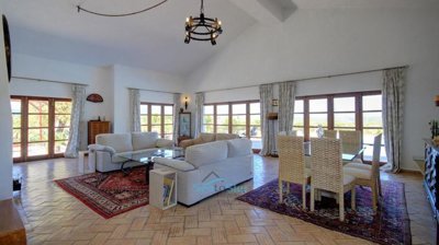 wall of windows flooding living area with natural light