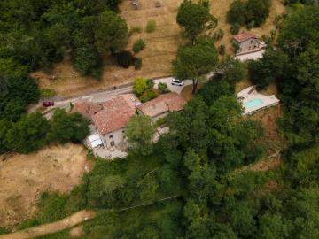 1--Borgo-Puccini-from-drone